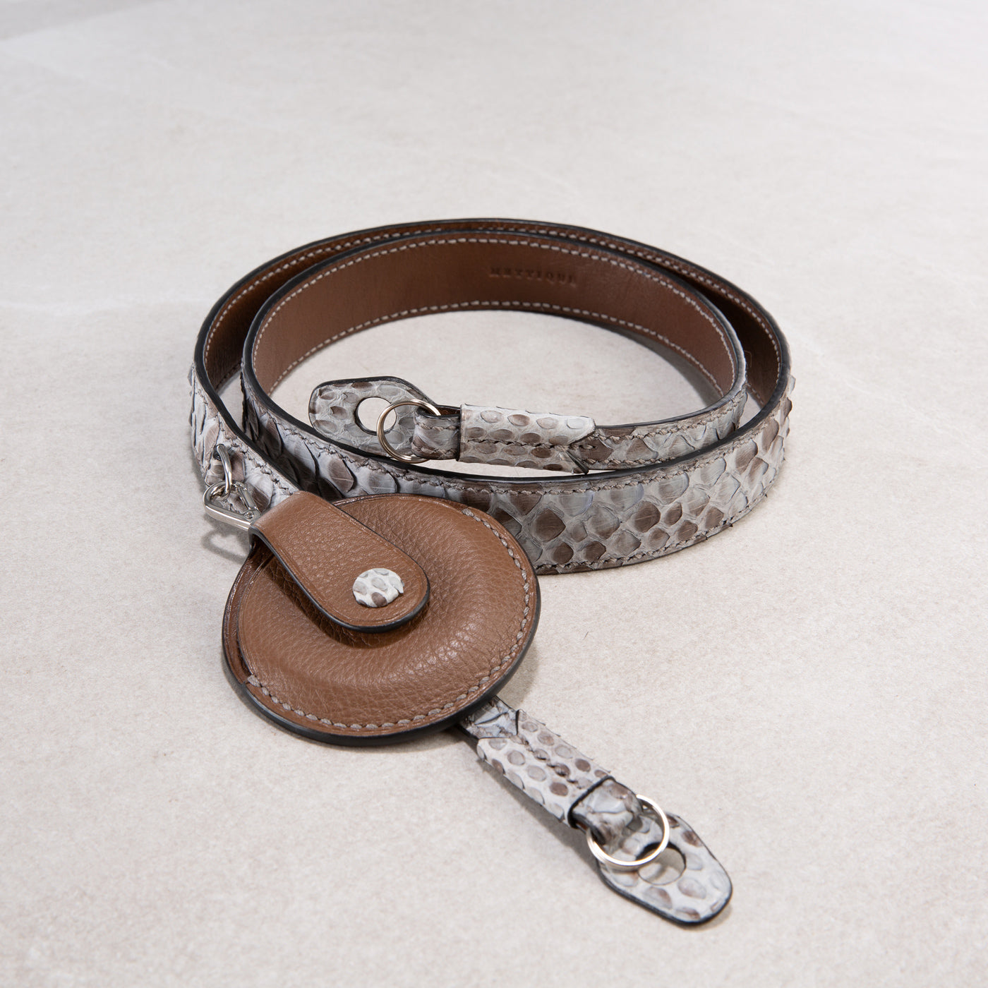 Bespoke camera neck strap with lens cap pouch